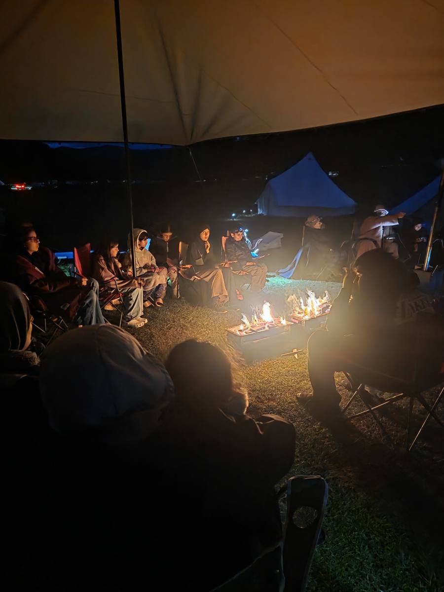 Community around campfire
